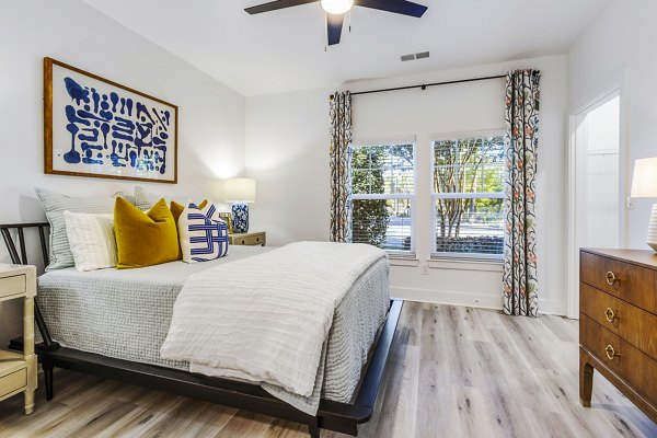 Cozy bedroom with elegant decor at The Avenues at Verdier Pointe Apartments