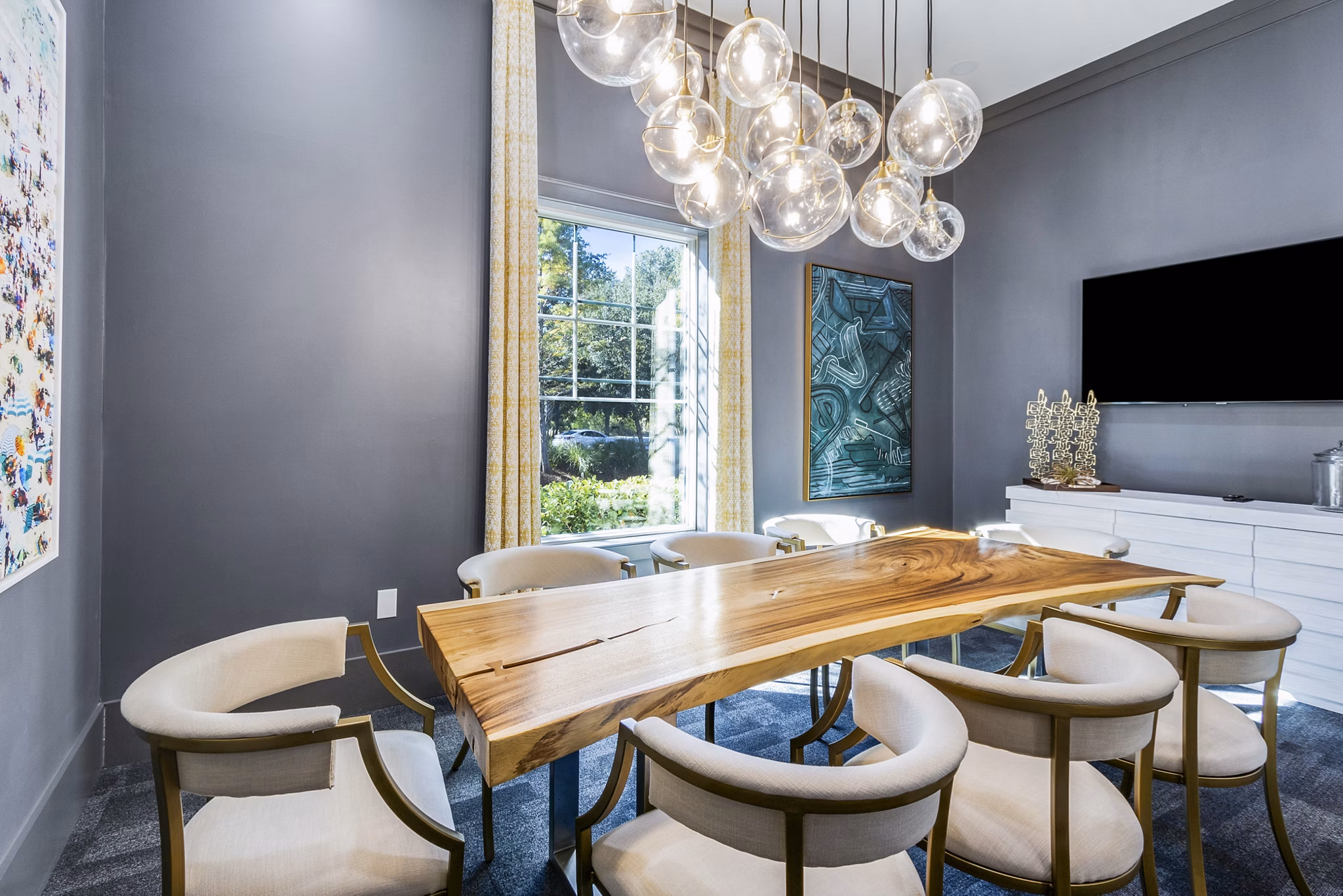 Modern clubhouse meeting facility at The Avenues at Verdier Pointe Apartments offering luxurious amenities for residents