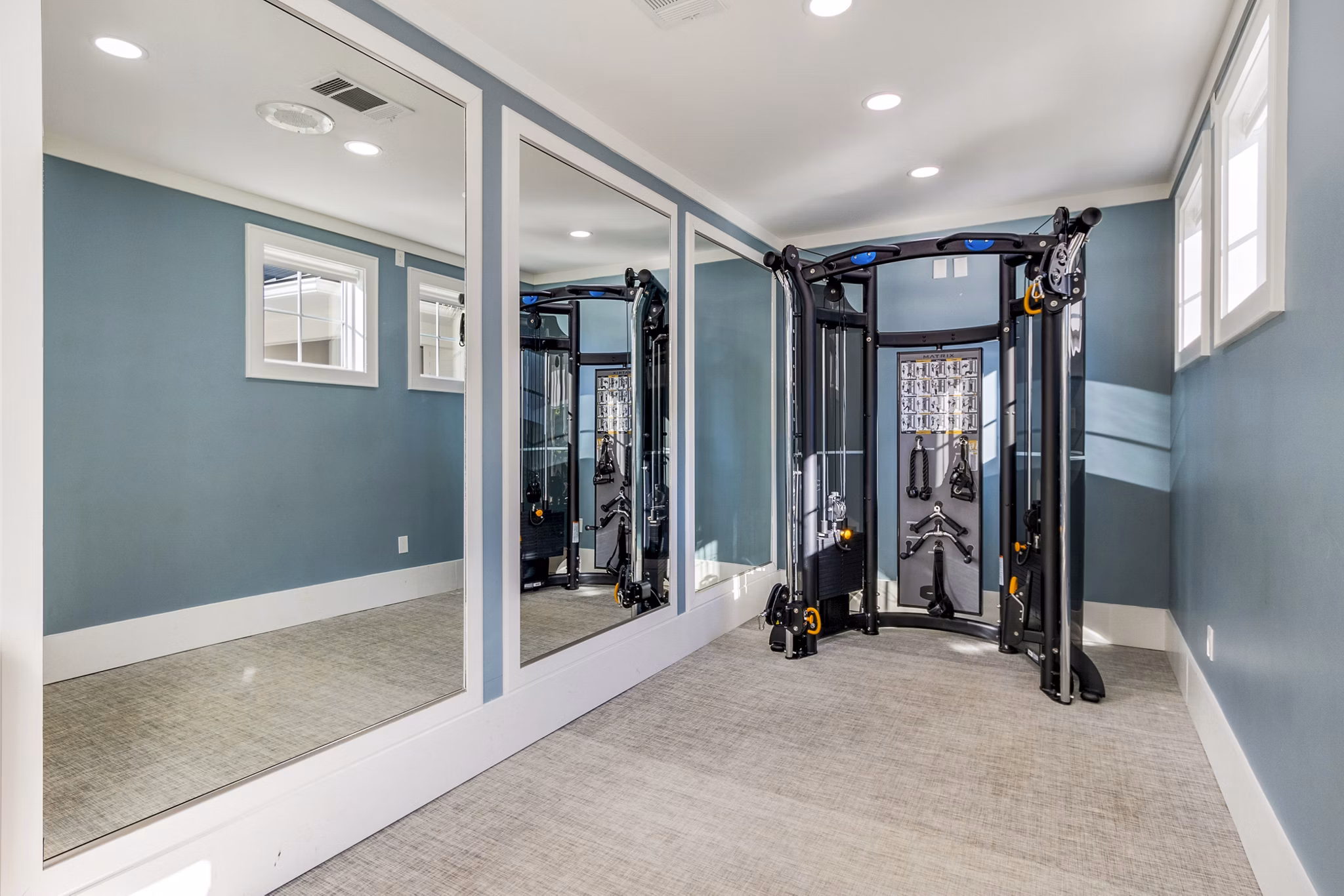 Fitness center with state-of-the-art equipment at The Avenues at Verdier Pointe Apartments for luxury living