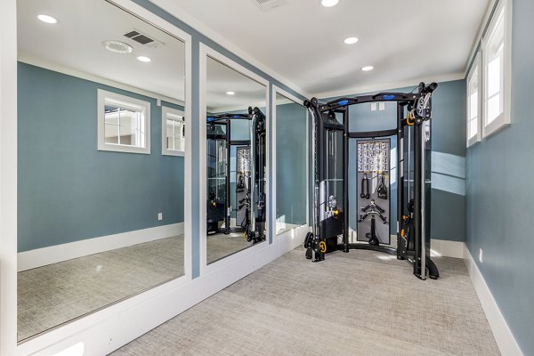 Fitness center with state-of-the-art equipment at The Avenues at Verdier Pointe Apartments for luxury living