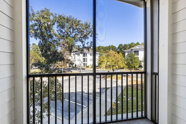 Patio with seating area at The Avenues at Verdier Pointe Apartments