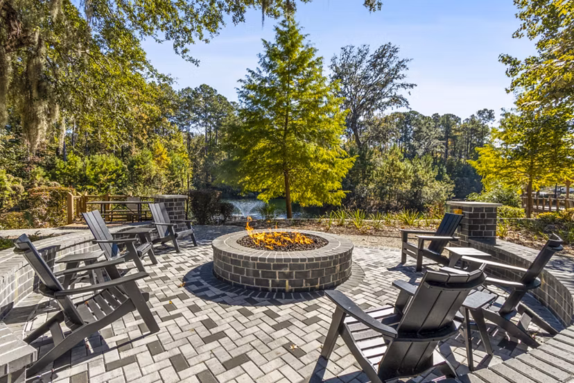 Patio with modern seating at The Avenues at Verdier Pointe Apartments offering luxury outdoor living spaces