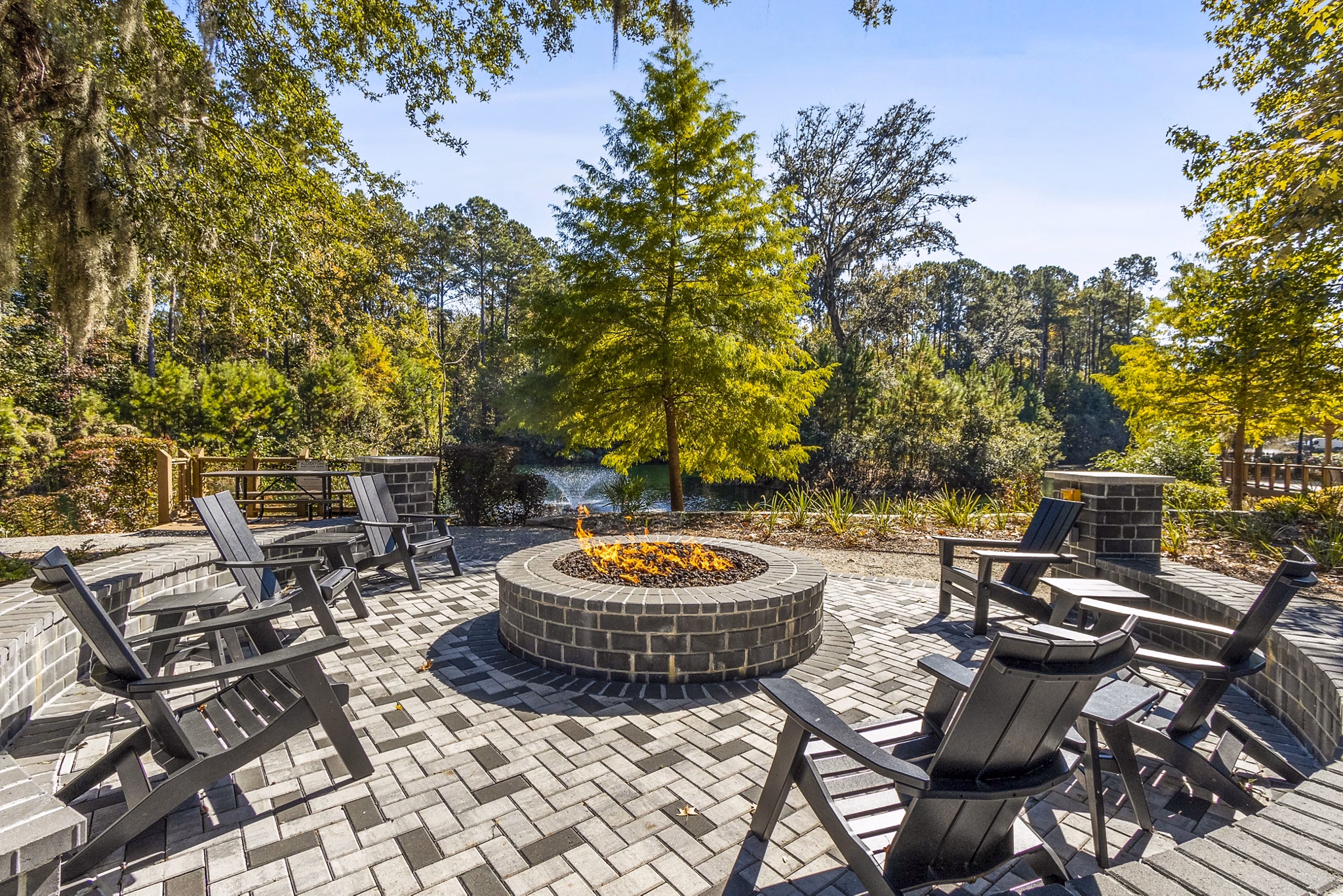 Patio with modern seating at The Avenues at Verdier Pointe Apartments offering luxury outdoor living spaces