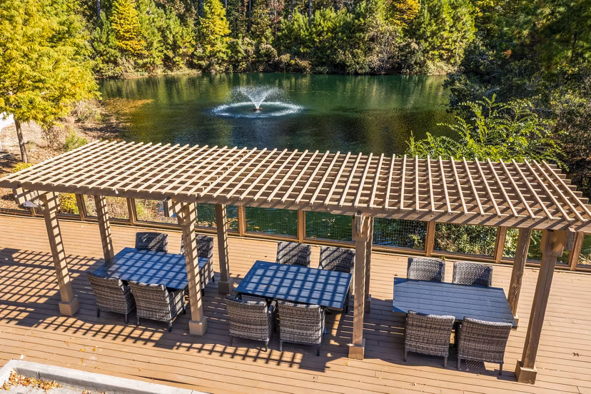 Spacious grill area and patio at The Avenues at Verdier Pointe Apartments, perfect for outdoor dining and socializing