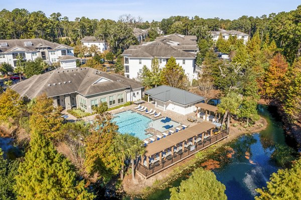Resort-style pool at The Avenues at Verdier Pointe Apartments, offering luxury relaxation and modern design amenities