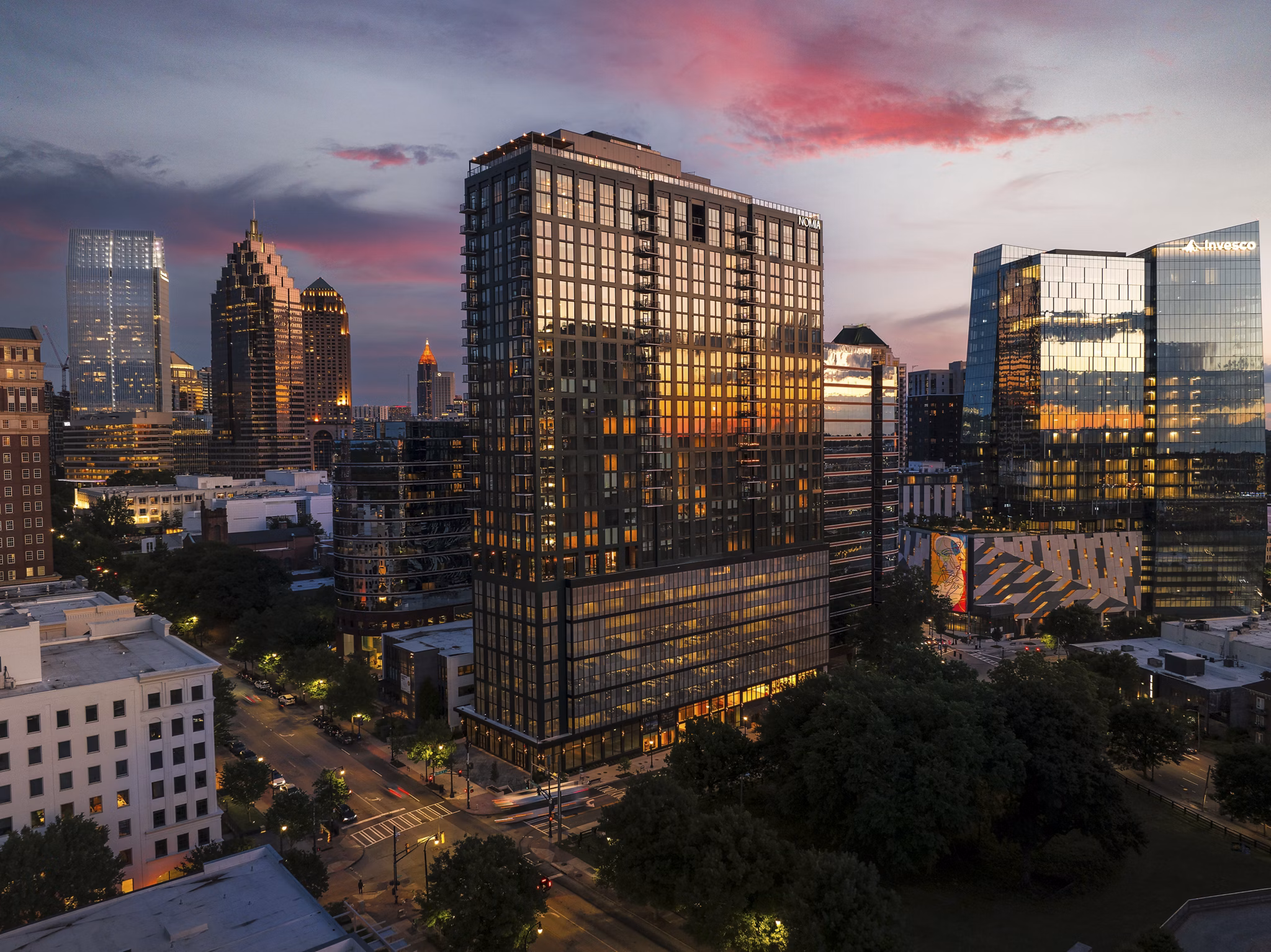Nomia Apartments: Contemporary luxury apartment building with unique architectural design in vibrant downtown area