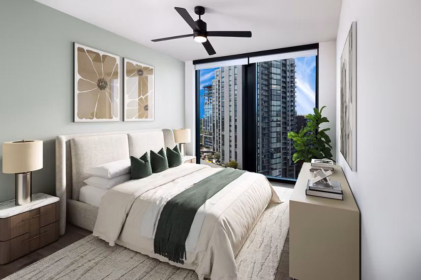 Cozy bedroom with modern decor at Nomia Apartments