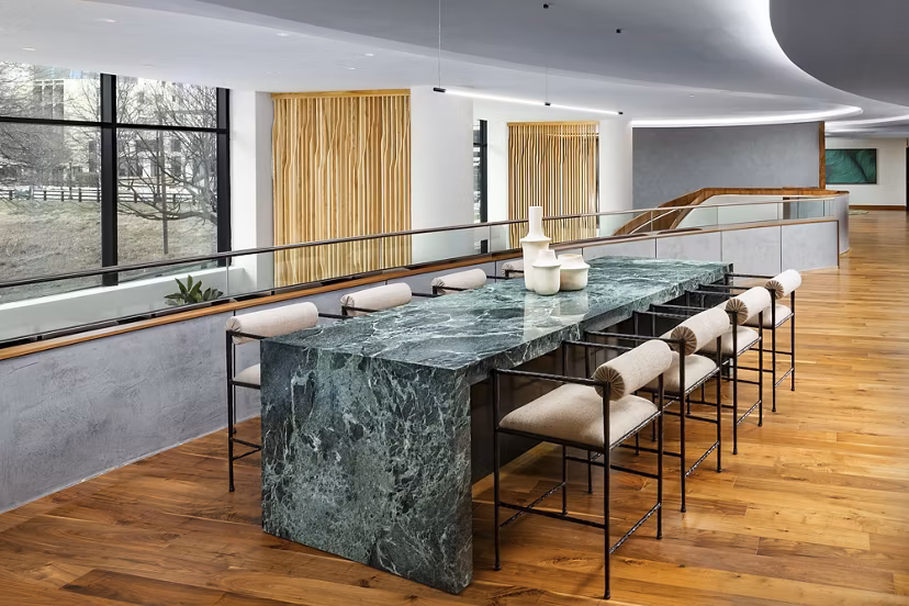 Clubhouse featuring modern design and comfortable seating at Nomia Apartments