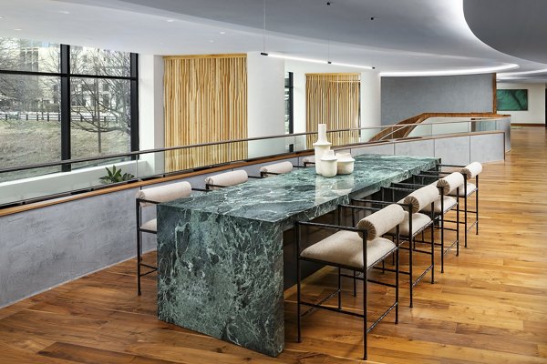 Clubhouse featuring modern design and comfortable seating at Nomia Apartments