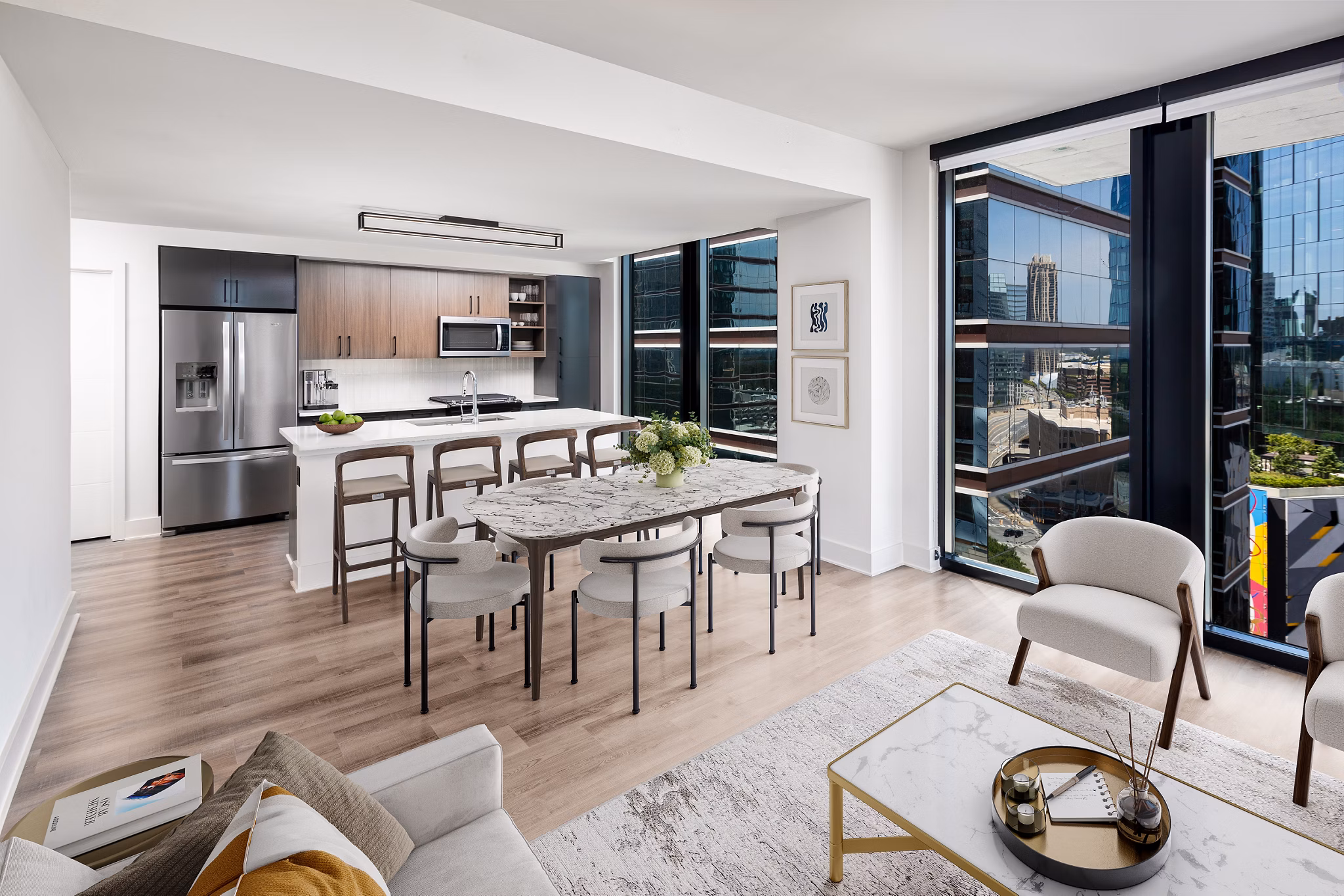 Dining area with elegant lighting and modern furnishings in Nomia Apartments