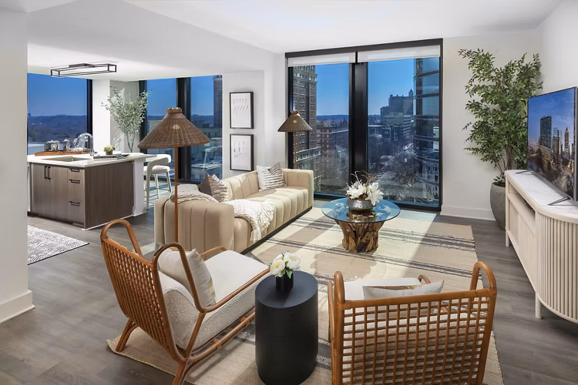 Spacious living room with contemporary furnishings at Nomia Apartments, featuring modern design and comfort in luxury living spaces