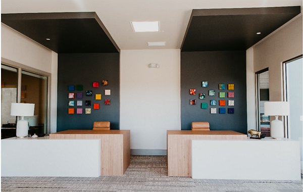 Modern clubhouse with plush seating at Tanager Apartments, a Greystar luxury community offering social and recreational spaces
