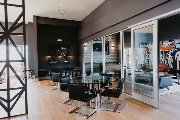 Elegant clubhouse featuring modern lounge seating at Tanager Apartments, a luxury community by Greystar