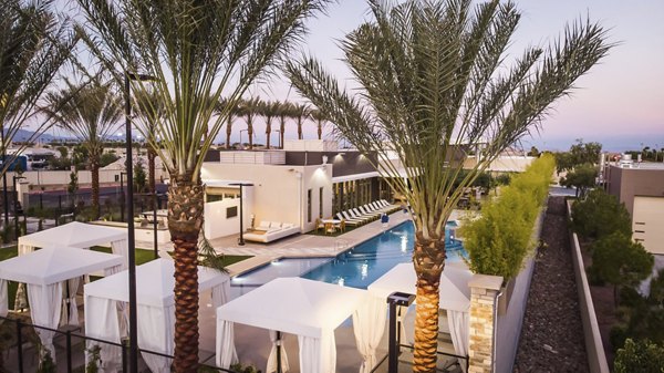 Tanager Apartments: Serene view of luxury apartments surrounded by lush landscapes, embodying modern living in an exclusive community