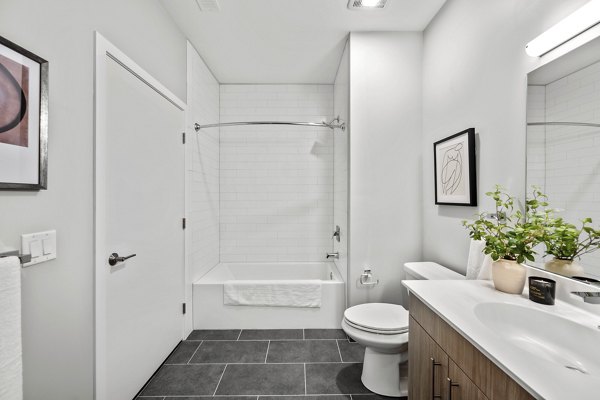 Modern bathroom with sleek fixtures at Arris Apartments, a luxury Greystar property