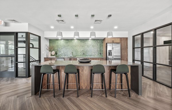 Clubhouse featuring modern design and social spaces at Arris Apartments, a luxury living community