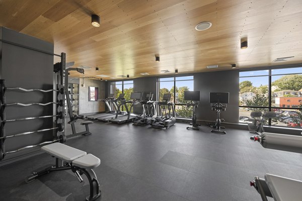 Fitness center with state-of-the-art equipment at Arris Apartments, offering residents modern workout facilities and amenities