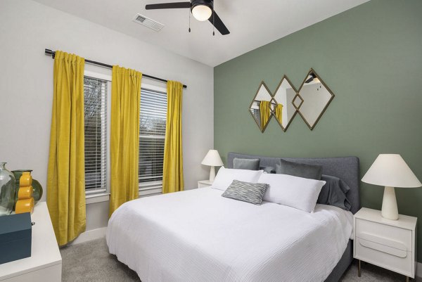 Spacious bedroom with modern decor at Broadstone Craft Apartments, ideal for luxury living