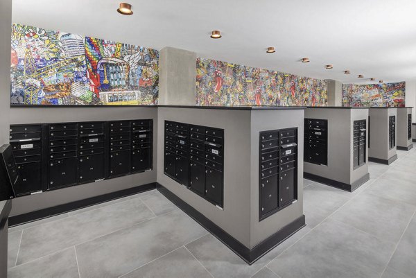 Mailroom featuring organized package lockers at Broadstone Craft Apartments