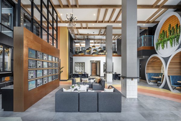 Clubhouse with modern lounge areas at Broadstone Craft Apartments in Charlotte, NC.