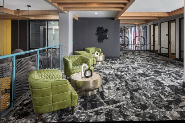 Clubhouse featuring modern decor and spacious areas at Broadstone Craft Apartments
