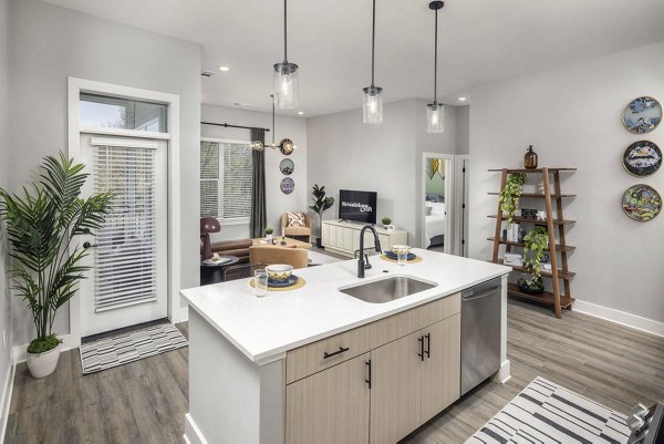 Modern kitchen with sleek cabinetry and stainless steel appliances at Broadstone Craft Apartments, offering luxury living in a prime location