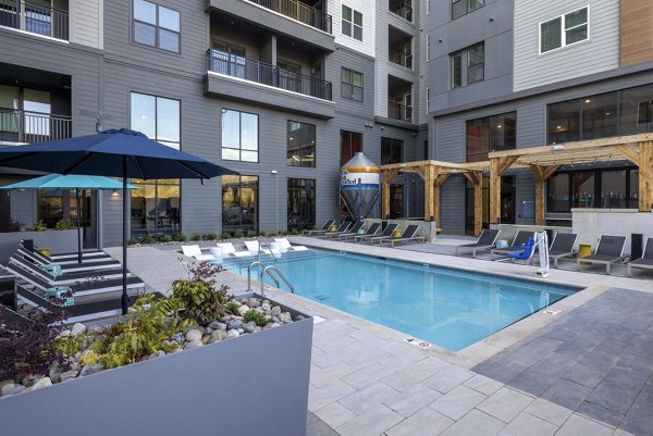 Rooftop pool with scenic views at Broadstone Craft Apartments