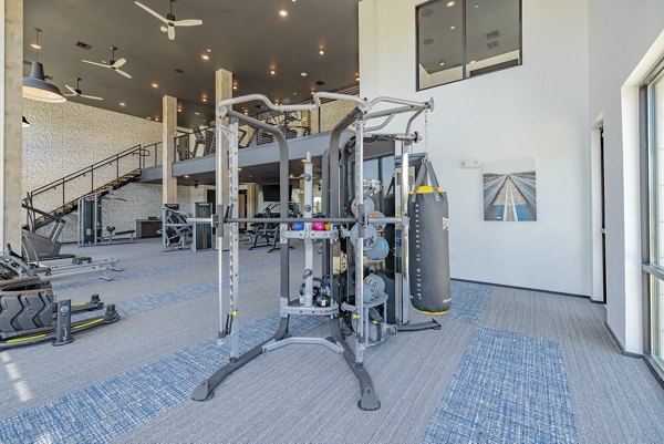 fitness center at Brea Frisco Apartments 