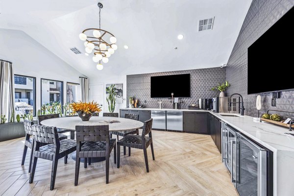 Clubhouse lobby with contemporary design and cozy seating at Hideaway North Scottsdale Apartments