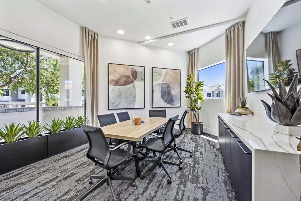 Elegant clubhouse at Hideaway North Scottsdale Apartments featuring modern design and cozy seating areas
