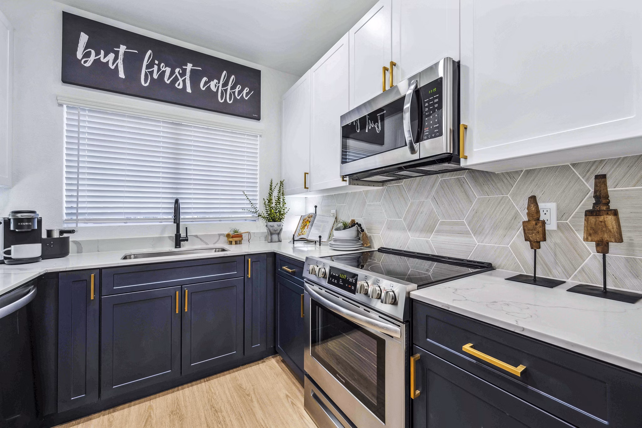 Modern kitchen with stainless steel appliances in Hideaway North Scottsdale Apartments