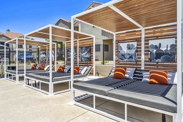 Chic patio with modern seating at Hideaway North Scottsdale Apartments, perfect for outdoor relaxation in luxury surroundings