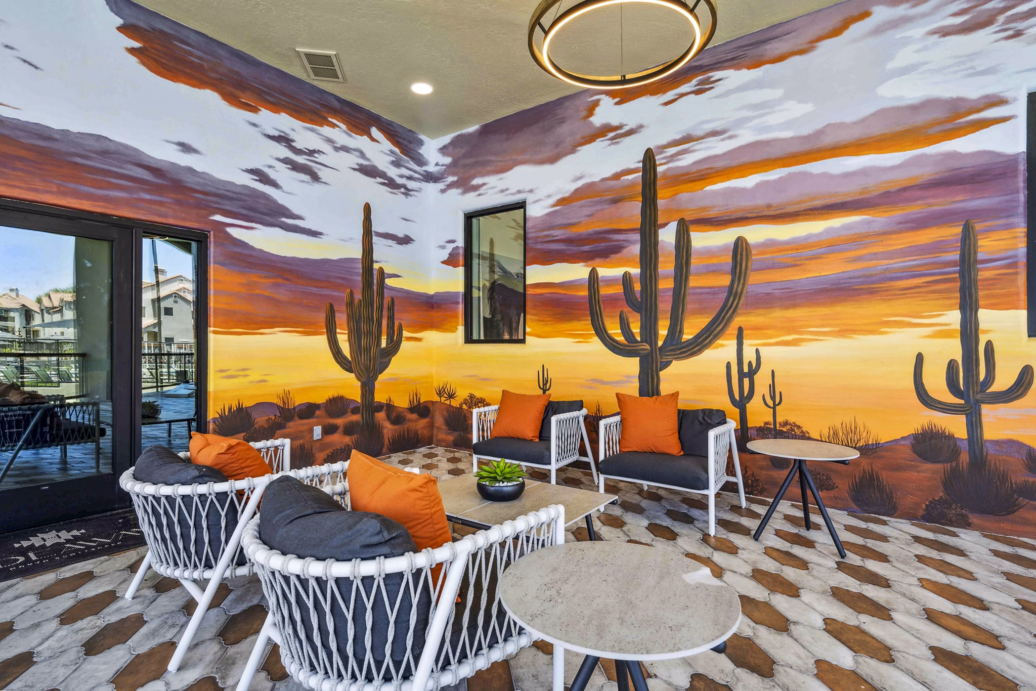 Spacious patio with outdoor seating at Hideaway North Scottsdale Apartments, ideal for relaxation and entertainment in luxury surroundings