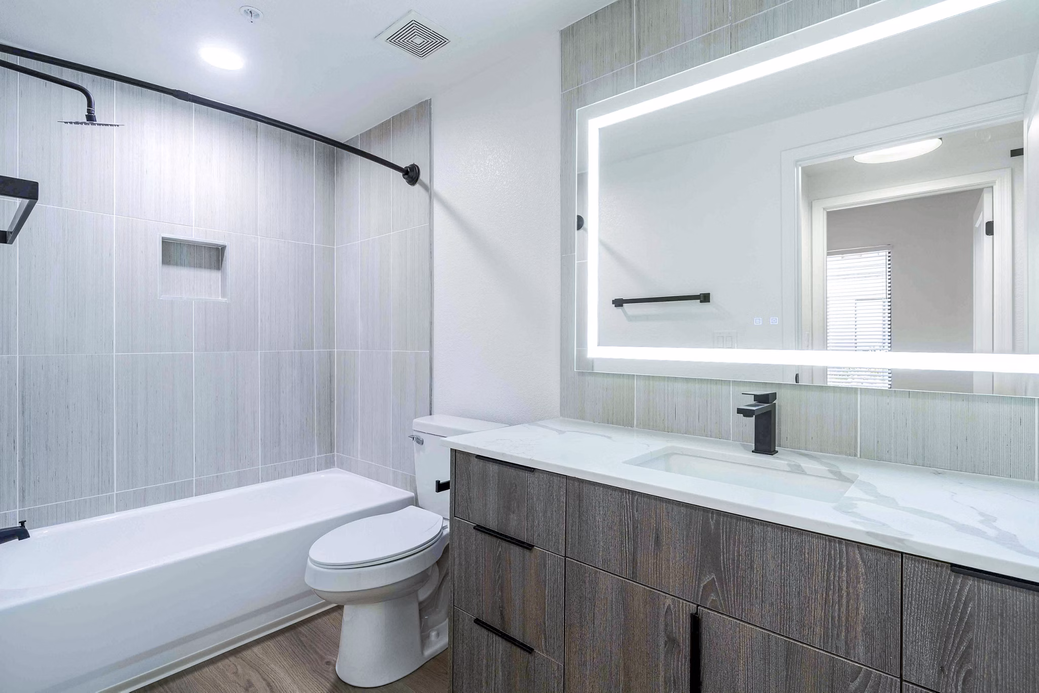 Nines at Kierland Apartments: Modern bathroom with sleek fixtures and marble countertops