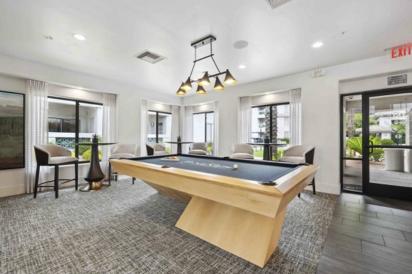 Clubhouse with modern decor and plush seating at Nines at Kierland Apartments