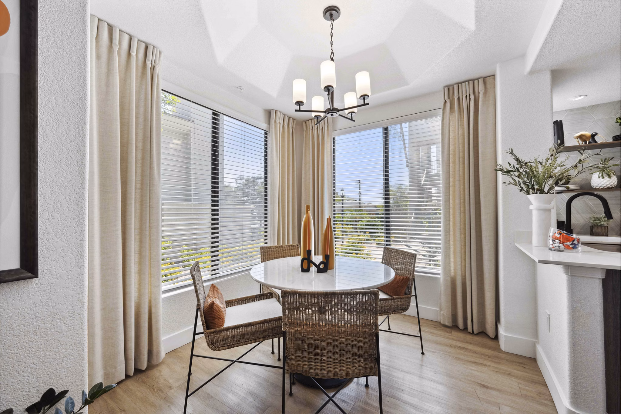 Dining area with modern decor and sleek furniture at Nines at Kierland Apartments