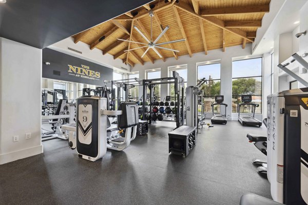 State-of-the-art fitness center featuring modern equipment at Nines at Kierland Apartments