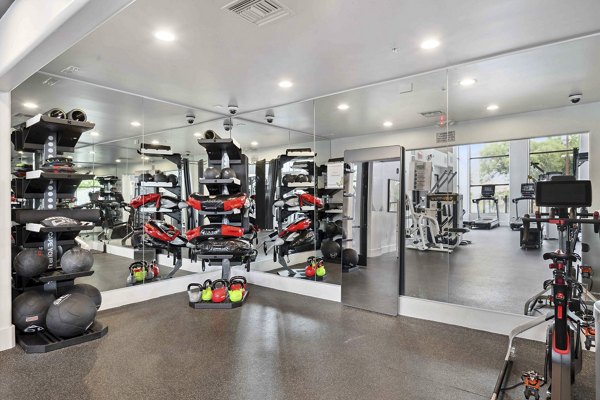 State-of-the-art fitness center with modern equipment at Nines at Kierland Apartments for luxury lifestyle seekers