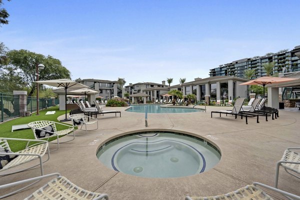 Relaxing hot tub at Nines at Kierland Apartments, perfect for unwinding in luxury surroundings