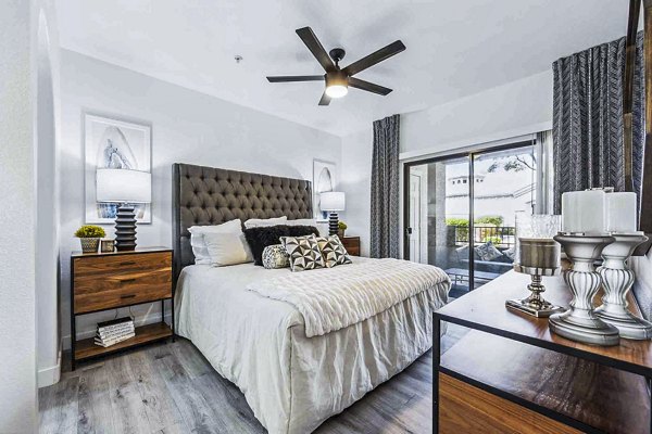 Cozy bedroom with contemporary decor at Zone Apartments