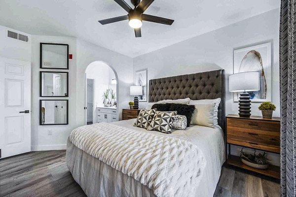 Cozy bedroom with modern furnishings at Zone Apartments for luxury living