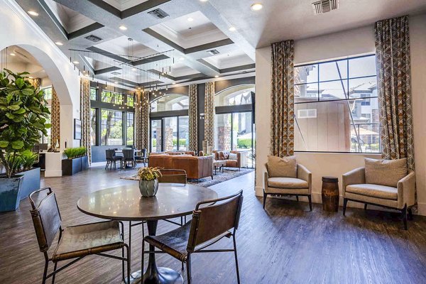 Modern clubhouse featuring stylish seating and entertainment facilities at Zone Apartments