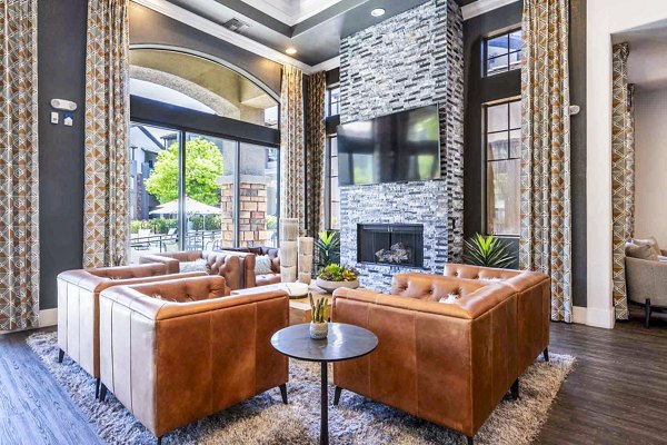 Clubhouse featuring modern design and cozy seating at Zone Apartments, an example of Greystar luxury living