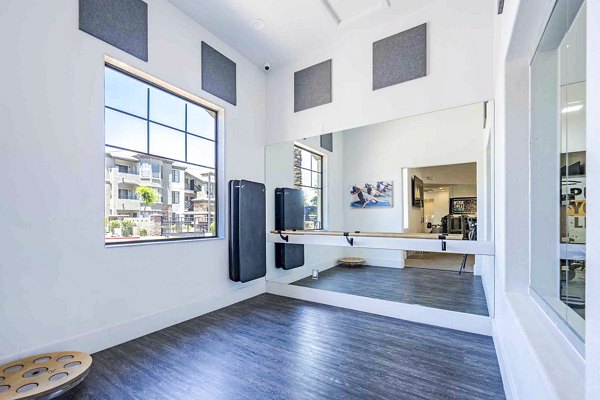 Modern fitness center with state-of-the-art equipment at Zone Apartments, a Greystar property