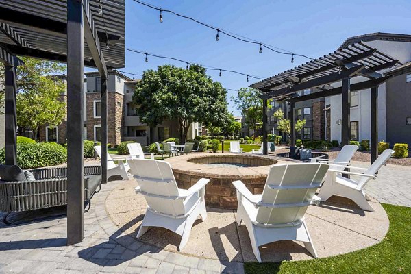 Cozy fire pit within the inviting courtyard at Zone Apartments