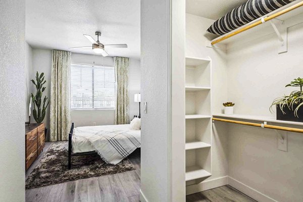 Cozy bedroom with large closet at Zone Luxe Apartments