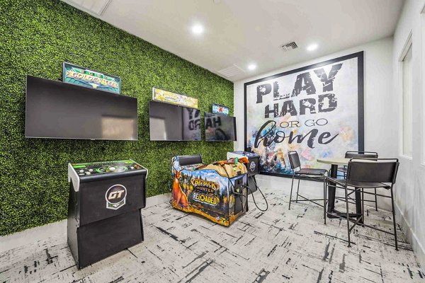 clubhouse game room at Zone Luxe Apartments