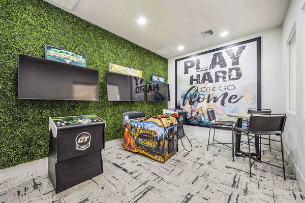 Zone Luxe Apartments: Clubhouse game room featuring billiards and modern decor