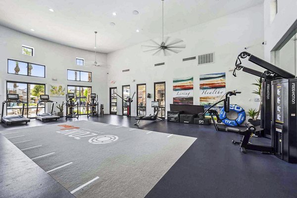 State-of-the-art fitness center at Zone Luxe Apartments with modern gym equipment and workout spaces, enhancing active lifestyles