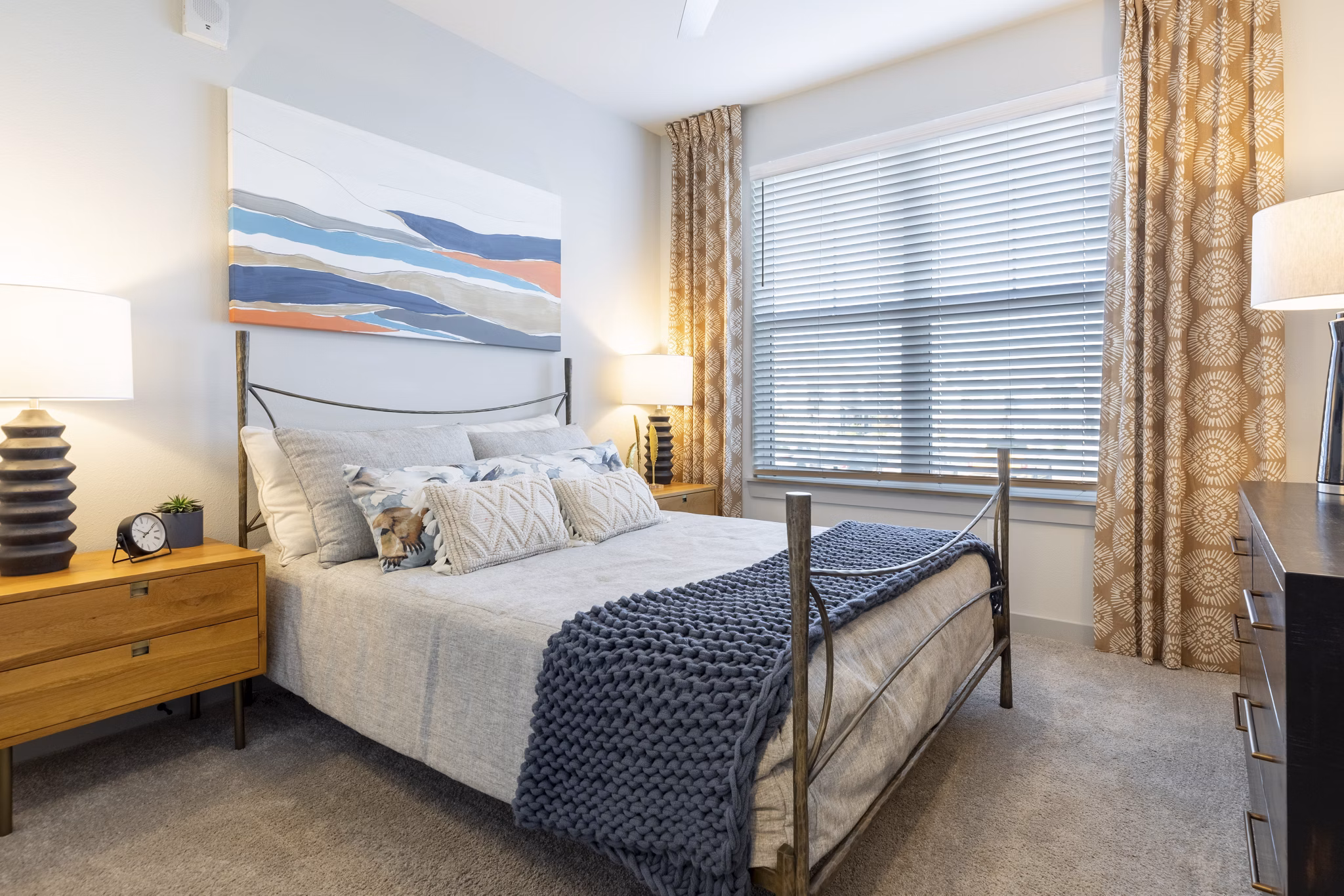 Cozy bedroom with elegant decor at Five810 Southlands Apartments